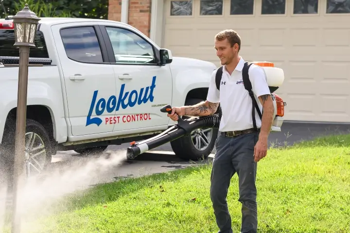 Mosquito treatment at Tennessee house performed by Lookout Pest Control technician